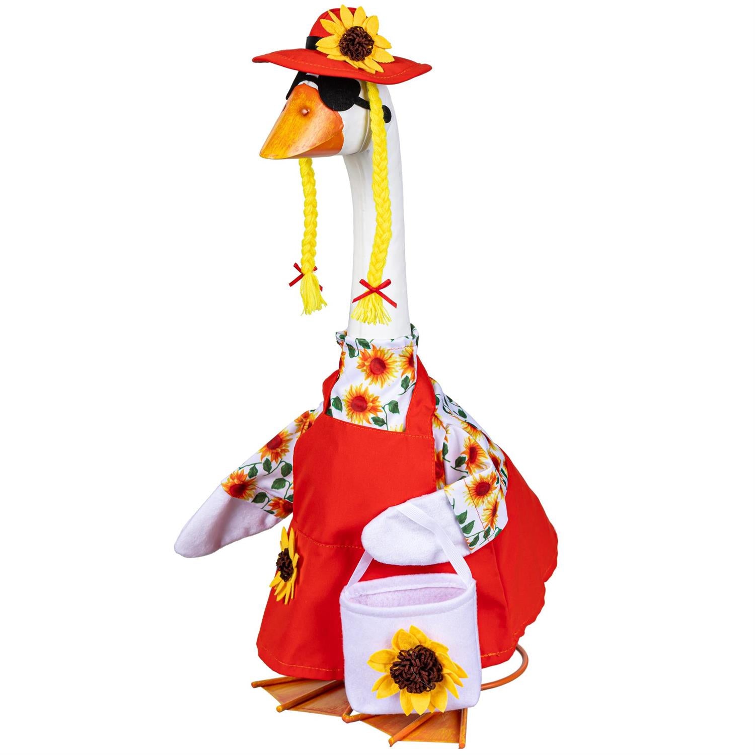 Giddy the Goose wearing a sunflower dress with matching hat and sunflower bag, displayed in a festive fall setting with pumpkins and autumn décor.