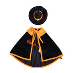 Giddy the Goose Witch Outfit featuring a black cape with orange trim, pointed witch hat, and broom accessory.