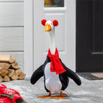 Giddy the Goose Winter Penguin Outfit by Evergreen featuring a black and white penguin design with cozy earmuffs and scarf for winter porch décor.