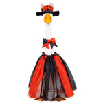 Front view of Giddy the Goose dressed in a Halloween Witch Outfit with a black witch hat, orange accents, and layered tulle skirt.