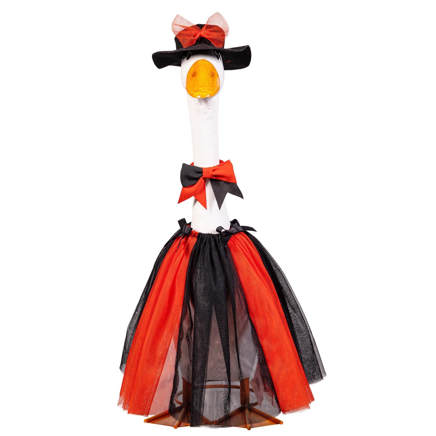 Front view of Giddy the Goose dressed in a Halloween Witch Outfit with a black witch hat, orange accents, and layered tulle skirt.
