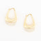 A pair of gold crescent-shaped hoop earrings with a polished finish, displayed on a clean white background with soft reflections below.
