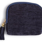 Three small zip-up pouches in red, green, and blue with tassels on a white background