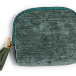 Three small zip-up pouches in red, green, and blue with tassels on a white background