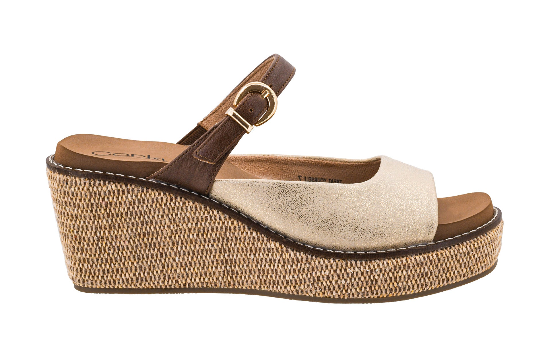 Wedge sandal with brown strap and beige suede upper on a white background