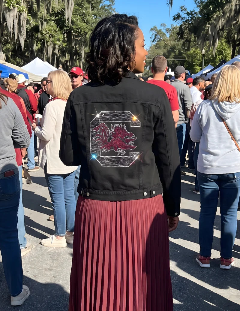 Officially licensed NCAA USC Spurs Up Gamecock denim jacket featuring University of South Carolina detailing in a classic button-front game-day style.