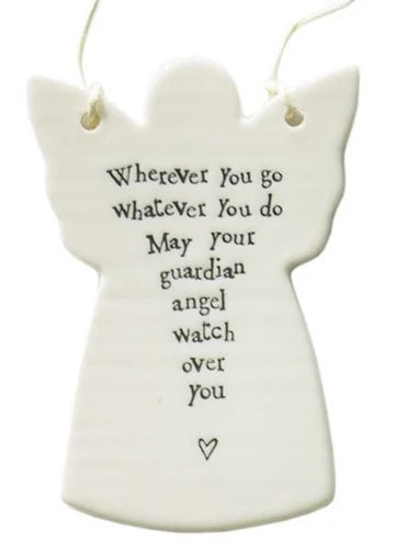 An off-white ceramic angel-shaped hanging ornament with black printed text that reads, 'Wherever you go whatever you do May your guardian angel watch over you' and a small heart at the bottom.