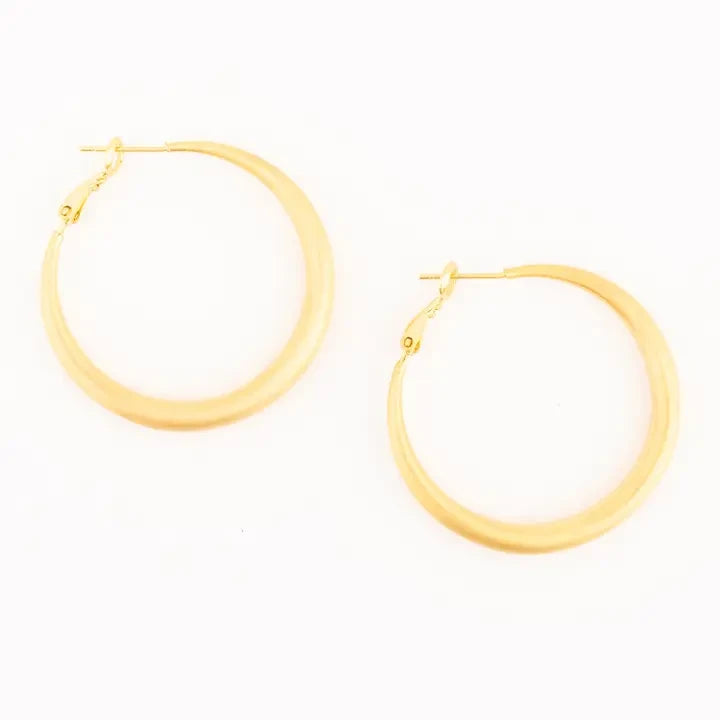 A pair of gold hoop earrings with a smooth, matte finish and post-back closures, displayed on a clean white background.