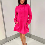 omen's hot pink honeycomb-textured statement coat with double-breasted covered buttons, high neckline, long sleeves, and front pockets.