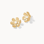 Gold flower-shaped earrings on a white background