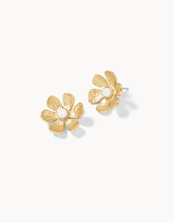 Gold flower-shaped earrings on a white background