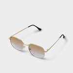 Gold-framed sunglasses with gradient lenses on a white background